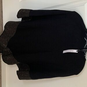 Black poncho by Coco and Carmen